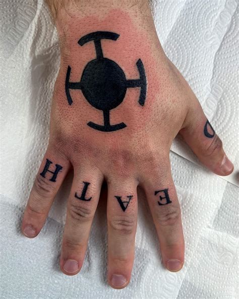 tatouage timbre|law hand tattoo.